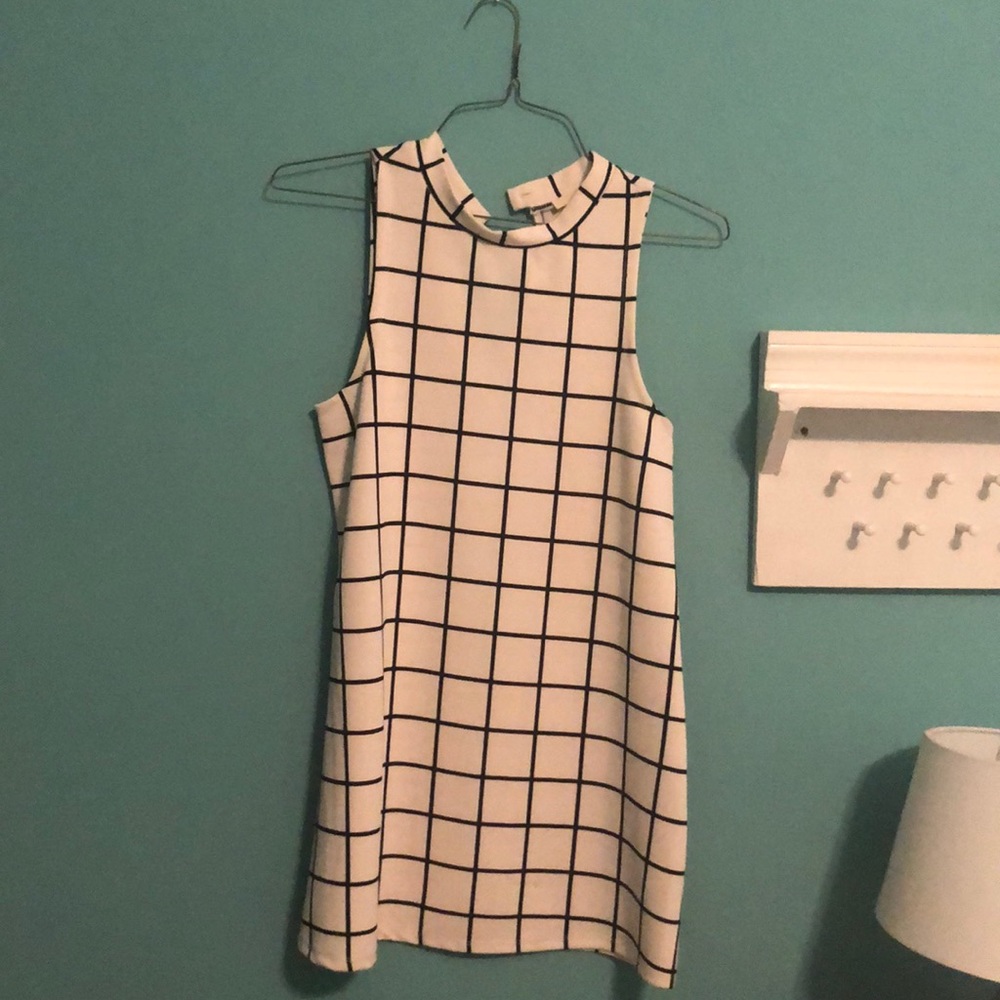 White dress with black checkered stripes